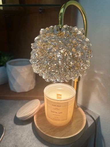 Elise Privé studio detail with candle and crystal lamp