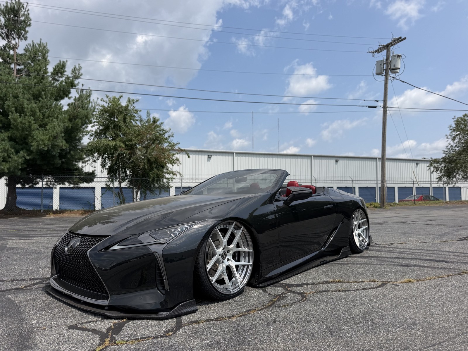 Black Lexus convertible fitted with polished REVO forged wheels