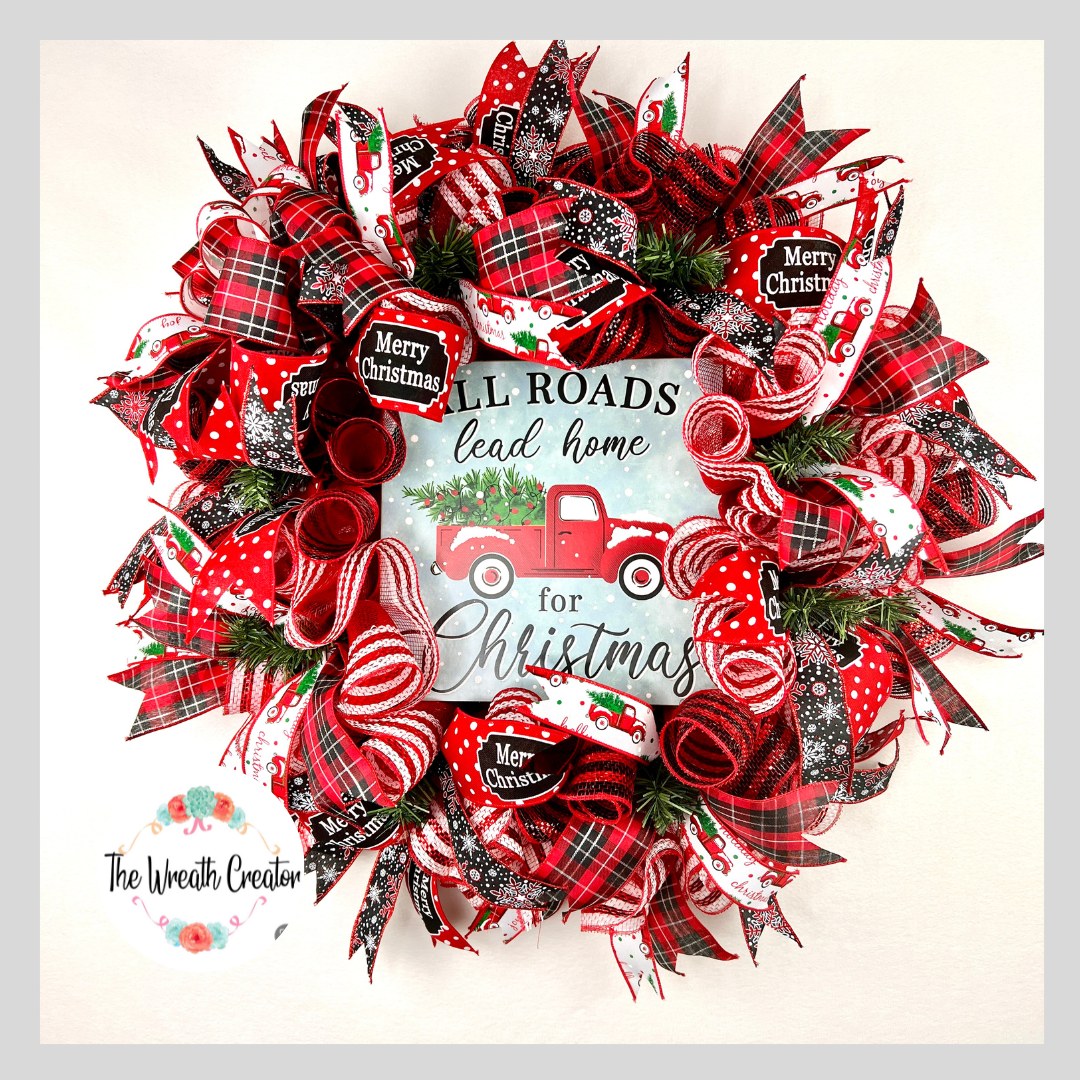 Christmas deco mesh wreath with red plaid, snowflake, and red truck ribbons