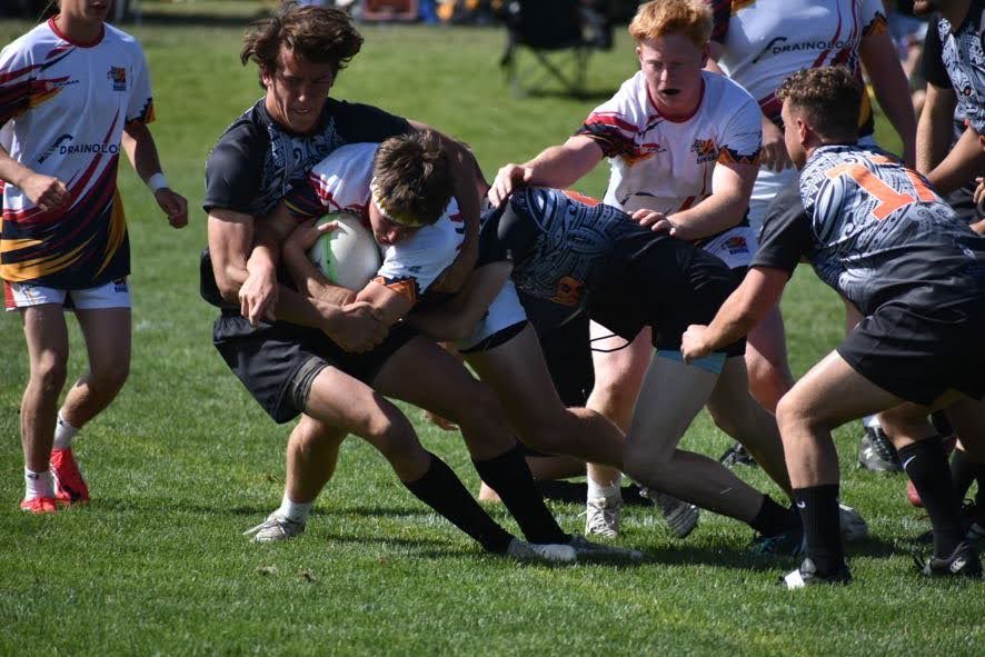 Youth rugby players competing on an Arizona field