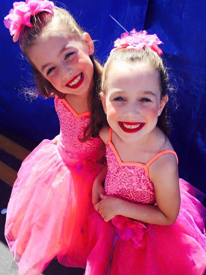 DMSD dancers in bright pink recital costumes
