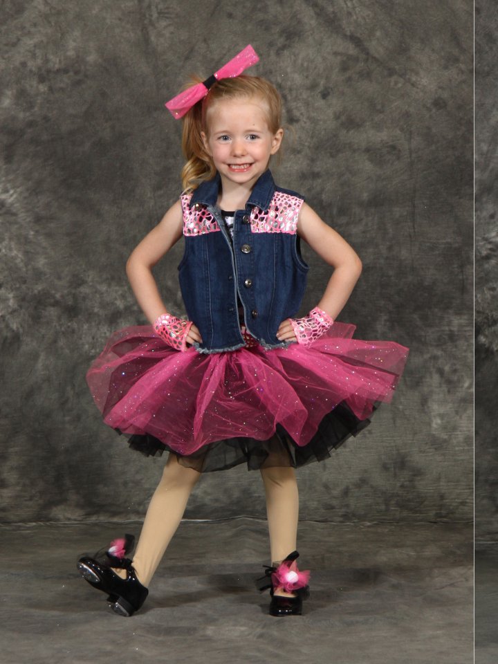 Young dancer in a pink recital costume