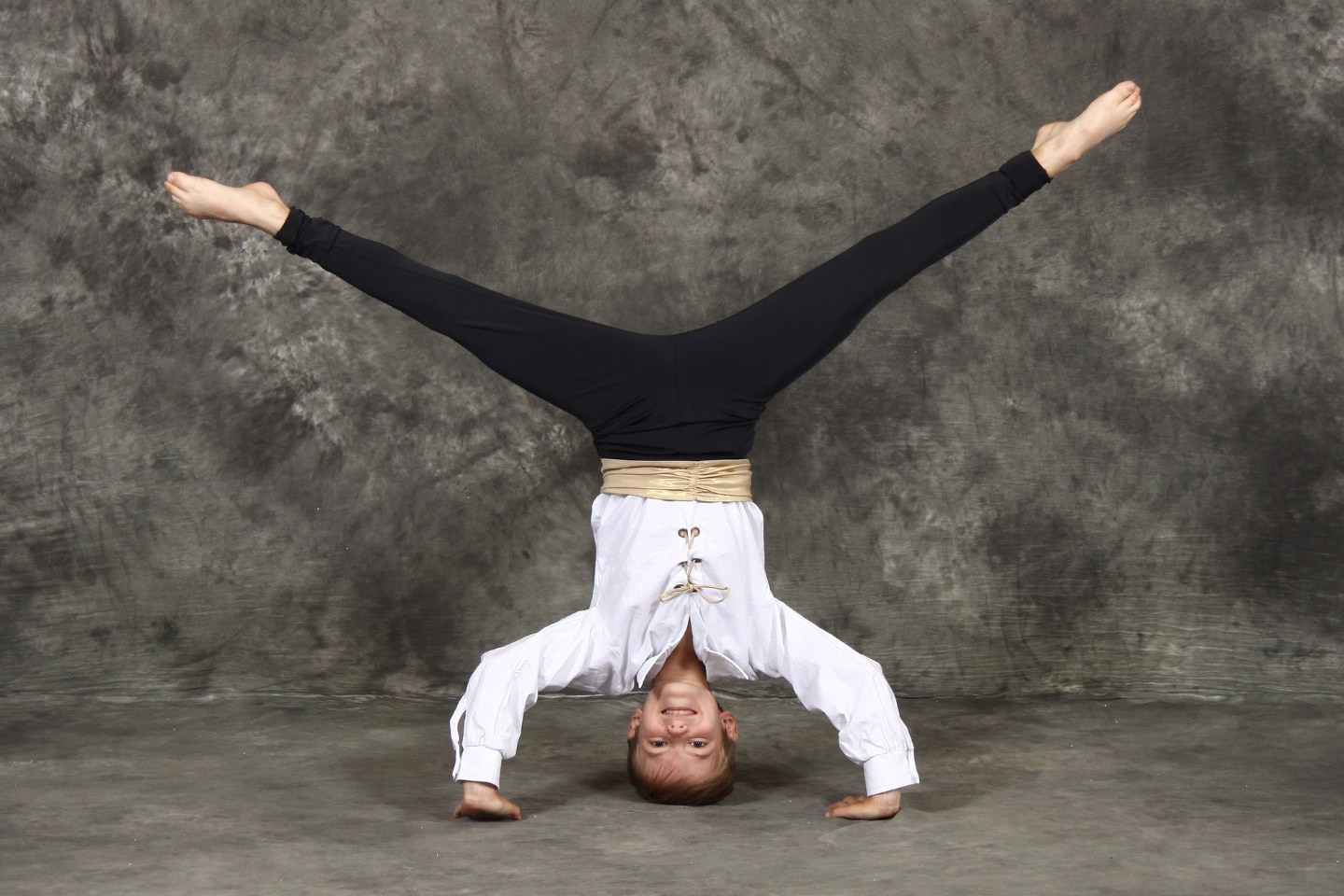 DMSD dancer showing a headstand