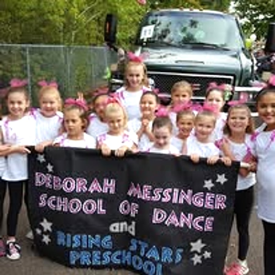 DMSD dancers and preschoolers at a parade