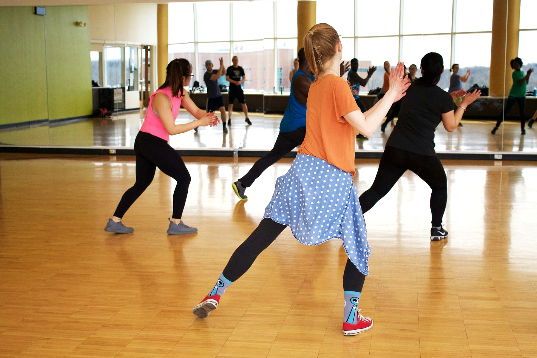 Teen and adult jazz dancers in class