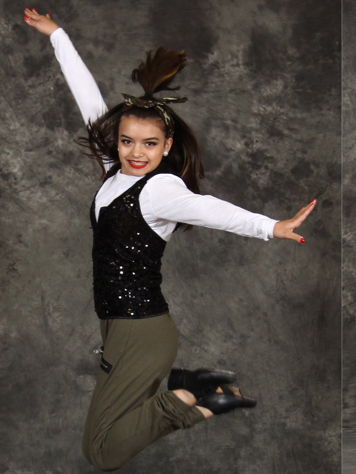 Dancer in a black recital costume