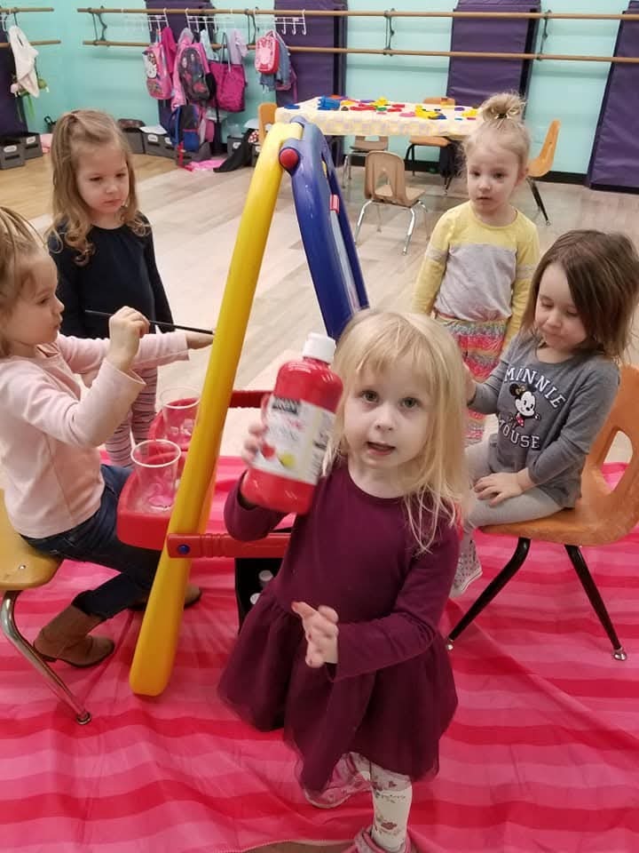 Children painting and exploring creative activities at Deborah’s Rising Stars Preschool