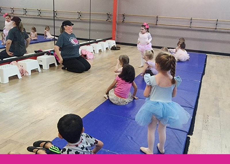 Dancers in the wood-floor studio classroom at Deborah Messinger School of Dance