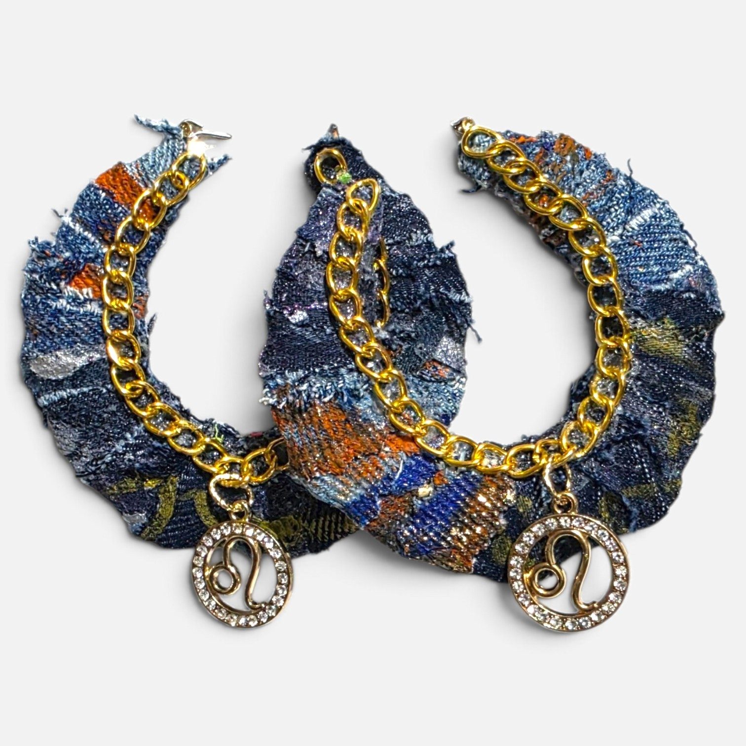 Denim hoop earrings with gold chain and Leo zodiac charms