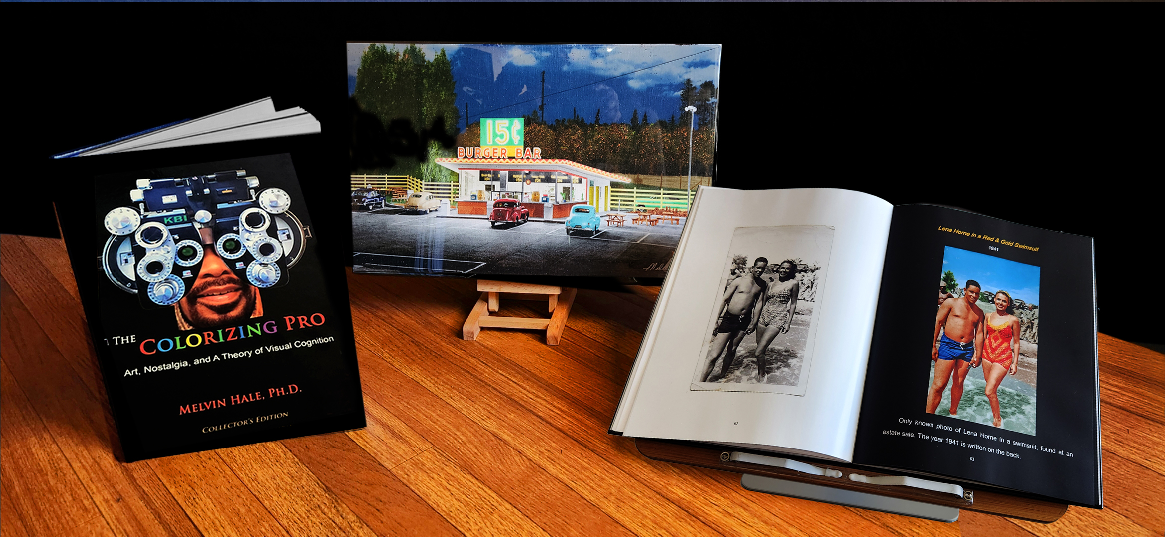 The Colorizing Pro alongside an open spread and a restored Day-Old Art piece