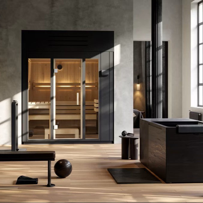 A Kohler indoor sauna with a wood interior and glass front