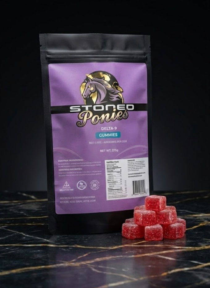 Stoned Ponies pre-rolls in protective packaging on a dark surface