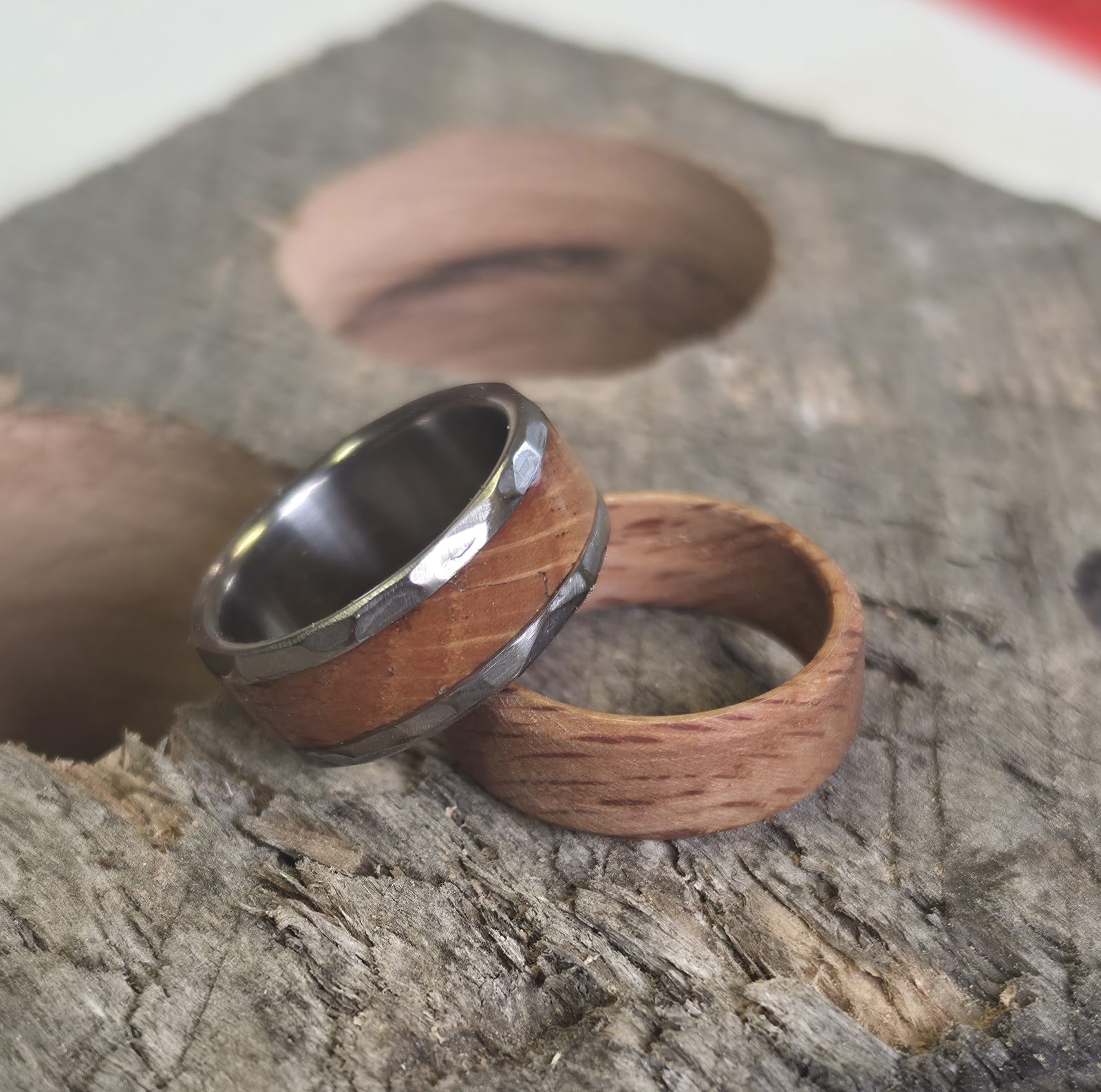 Finished ring set made with reclaimed red oak, resting on weathered wood