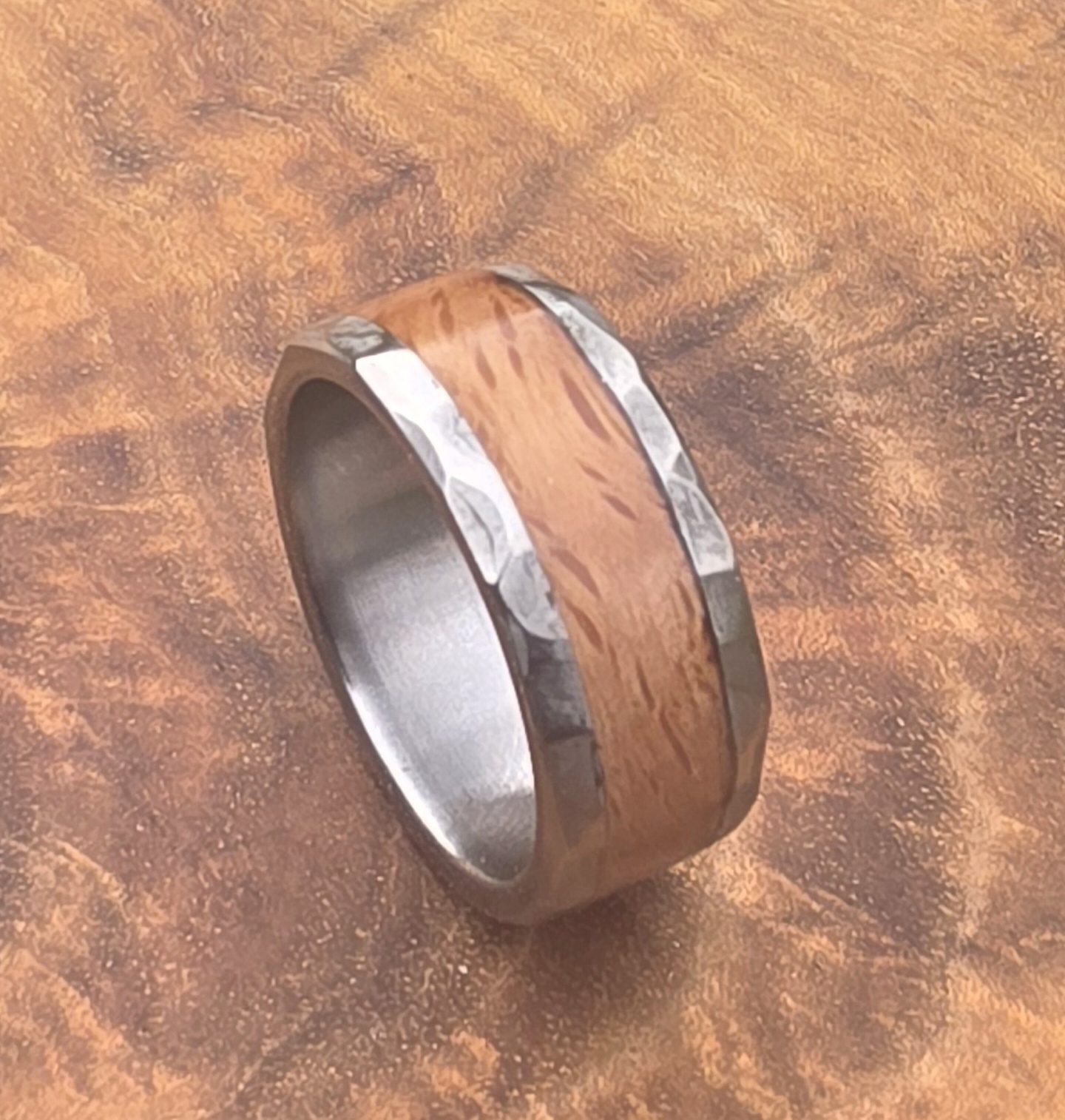 Close-up of a finished red oak inlay ring