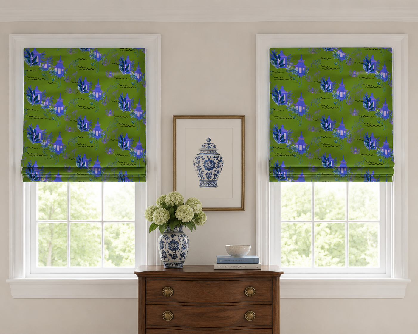 Blue floral Roman shades above a traditional chest