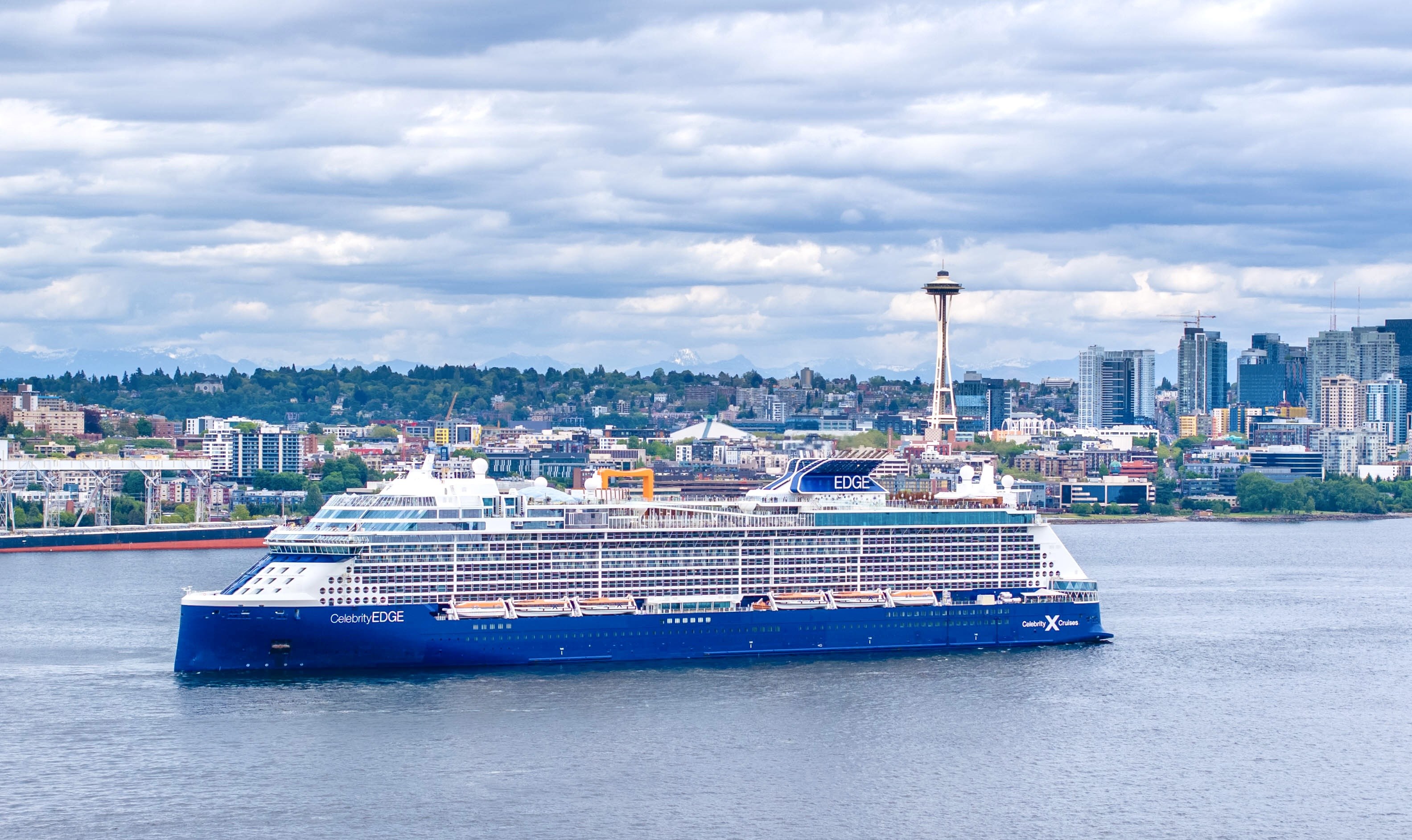 Celebrity Edge sailing near Seattle's waterfront.