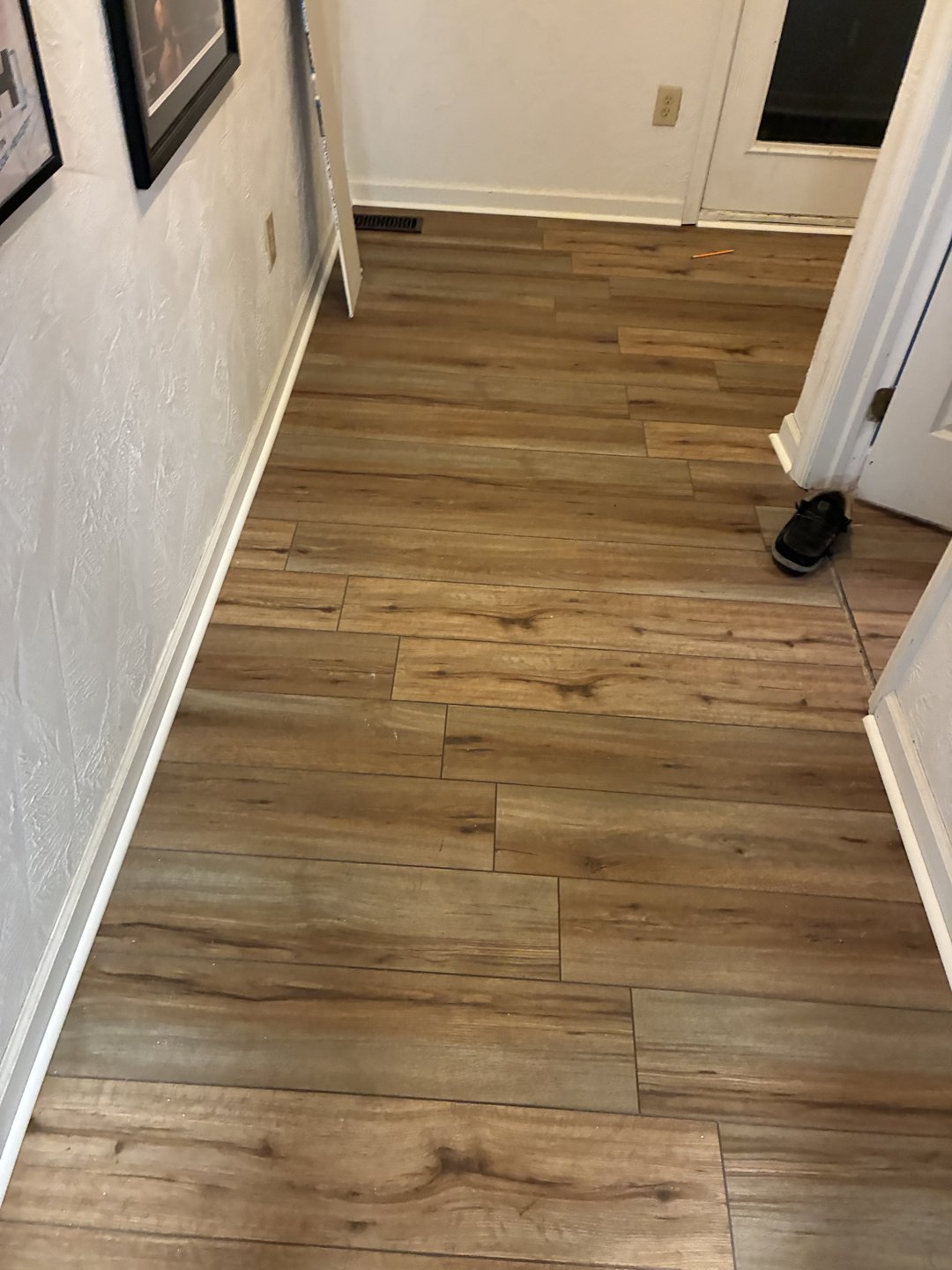Finished wood-look flooring in a hallway