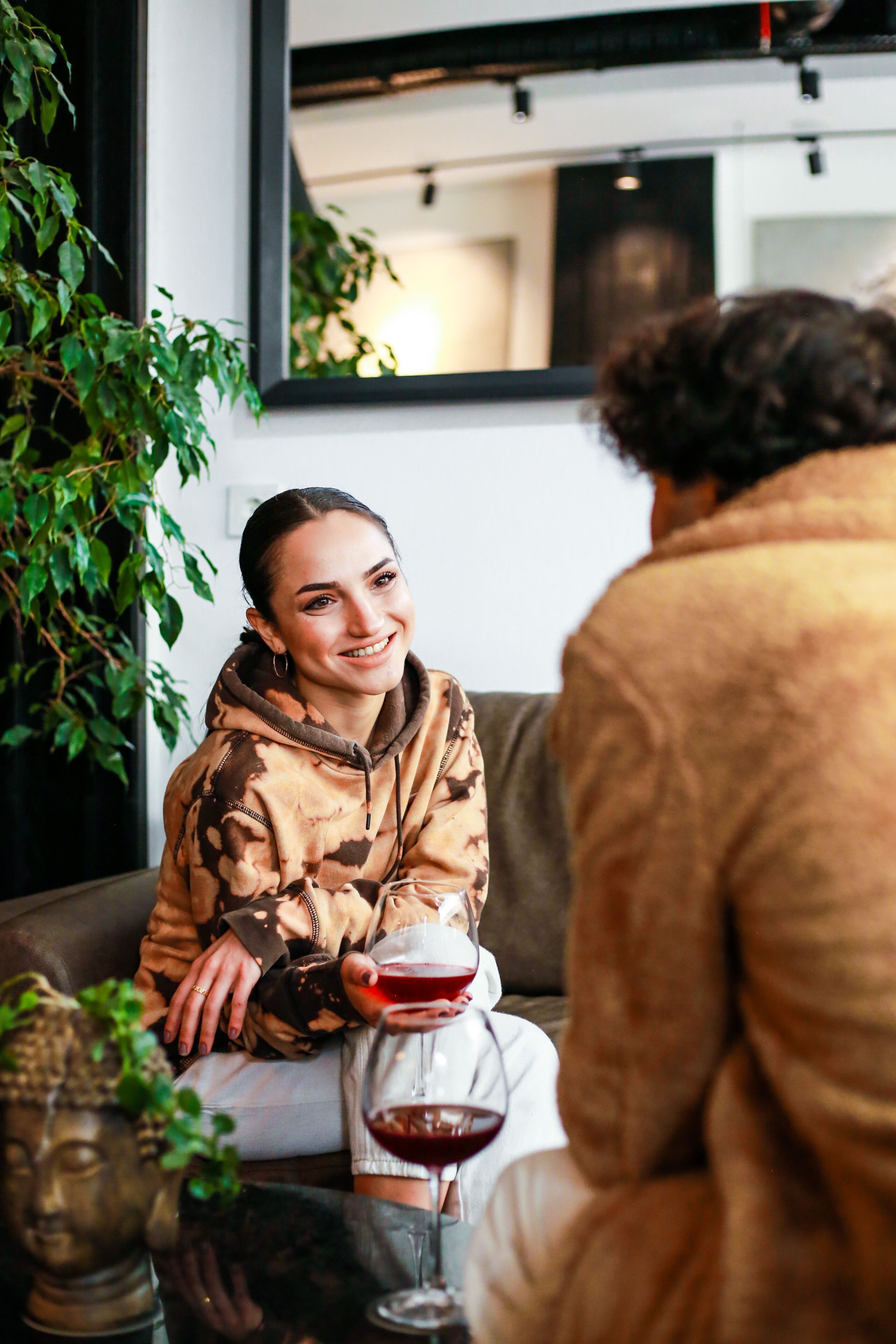 Two partners having a conversation at home.