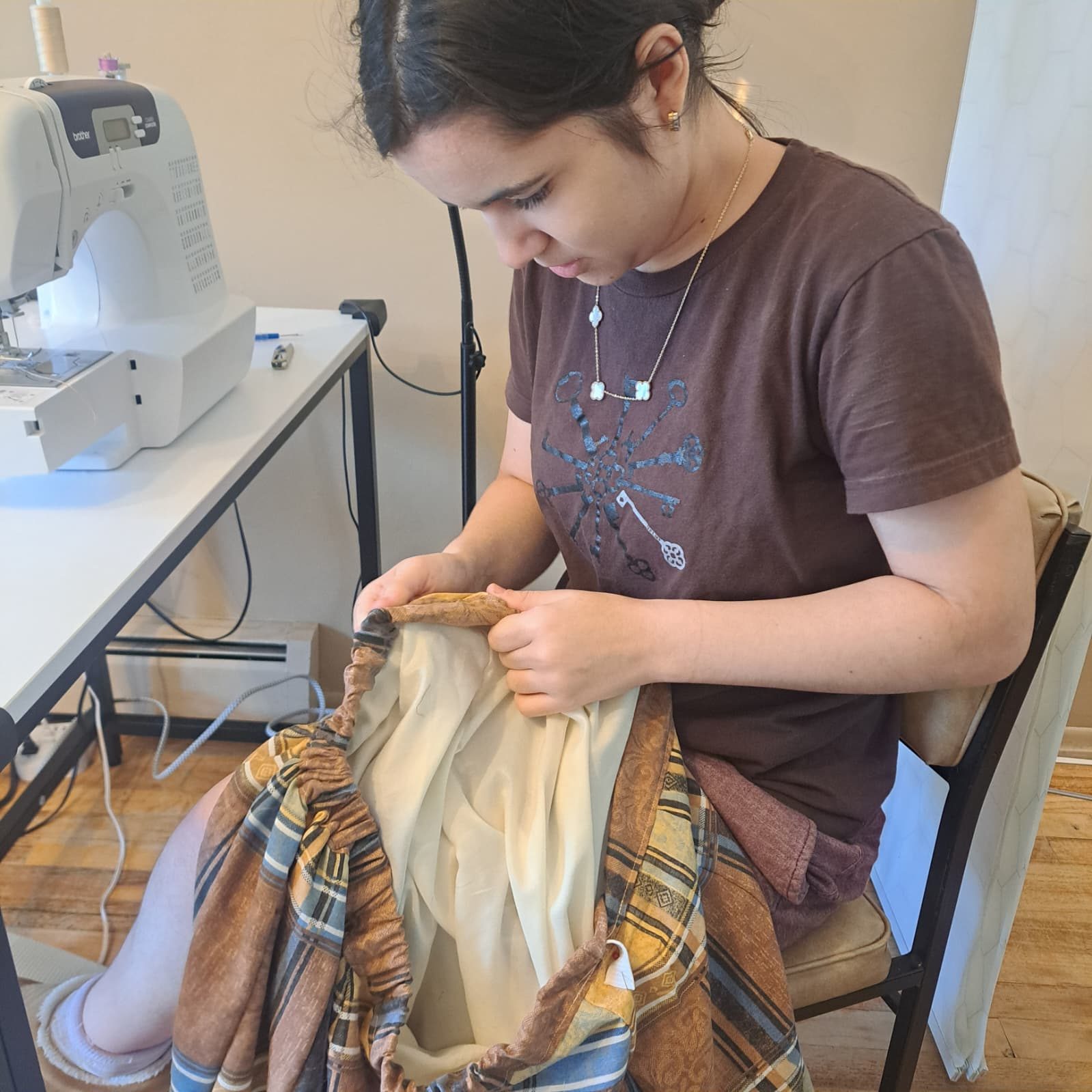 Sewing a garment at PYAJ Sewing Studio