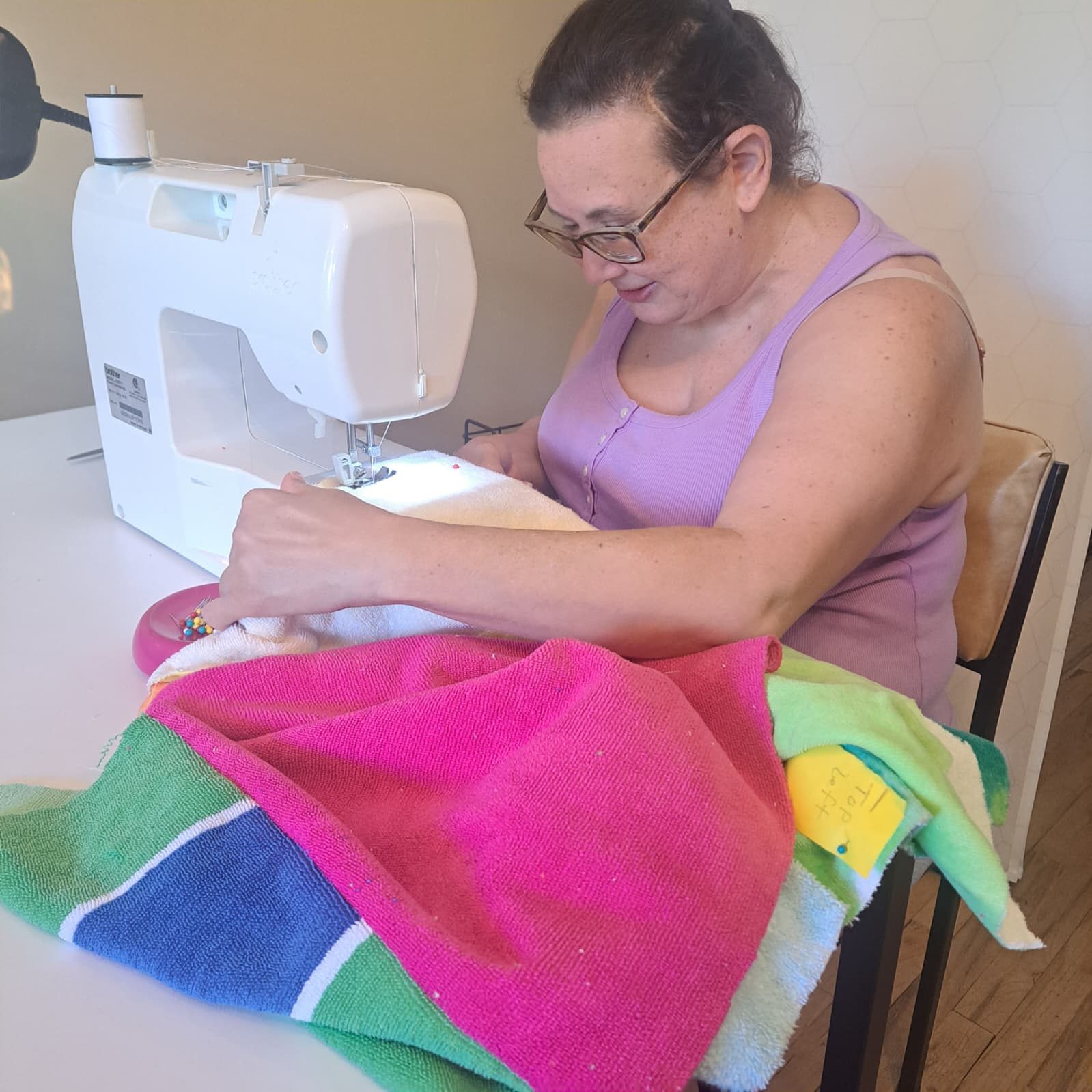 Sewing colorful fabric at PYAJ Sewing Studio