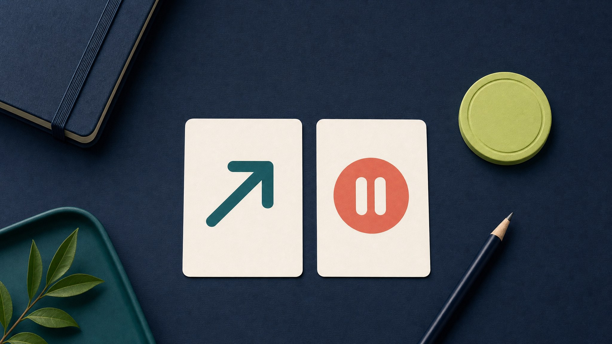 Two abstract decision cards, a budget token, and pencil arranged on a dark navy desk