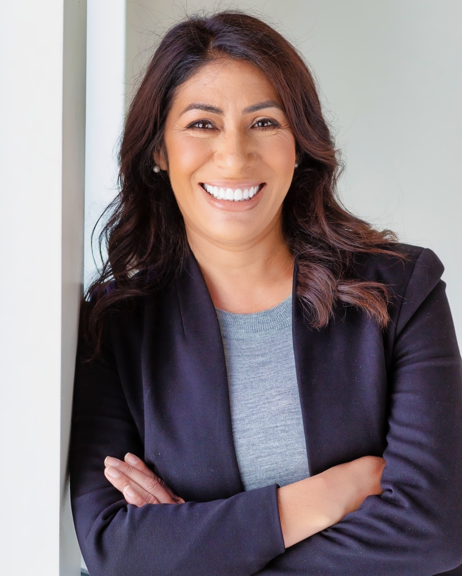 Emiliana Guereca smiling in a professional portrait