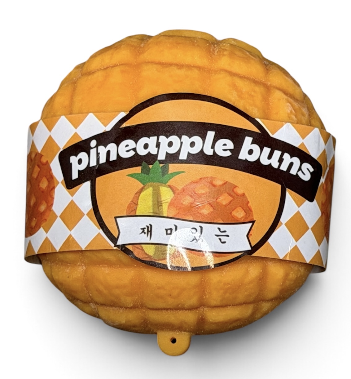 Pineapple bun fast rise foam squishy in its product packaging