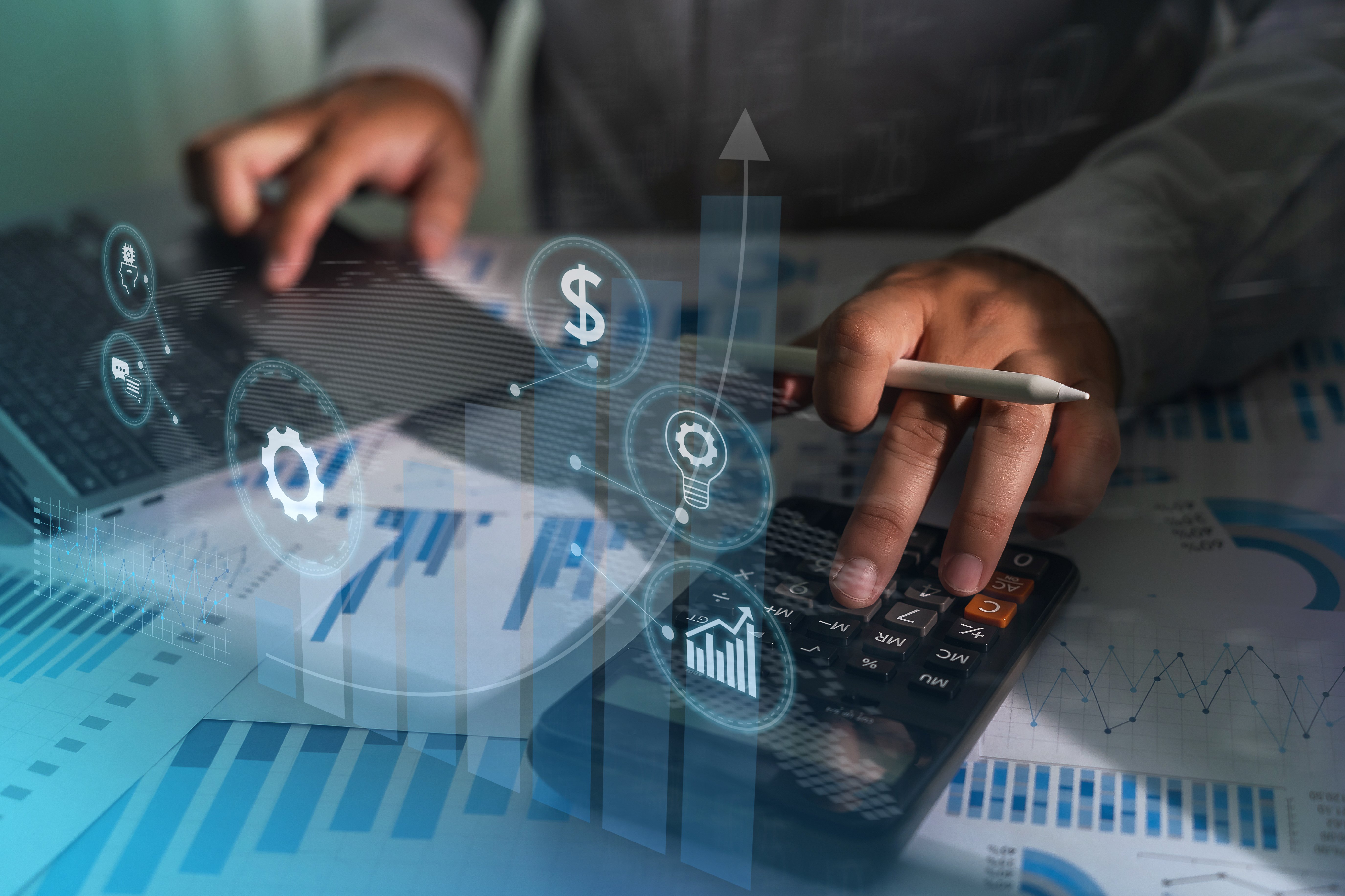 Business owner reviewing financial plans and calculations