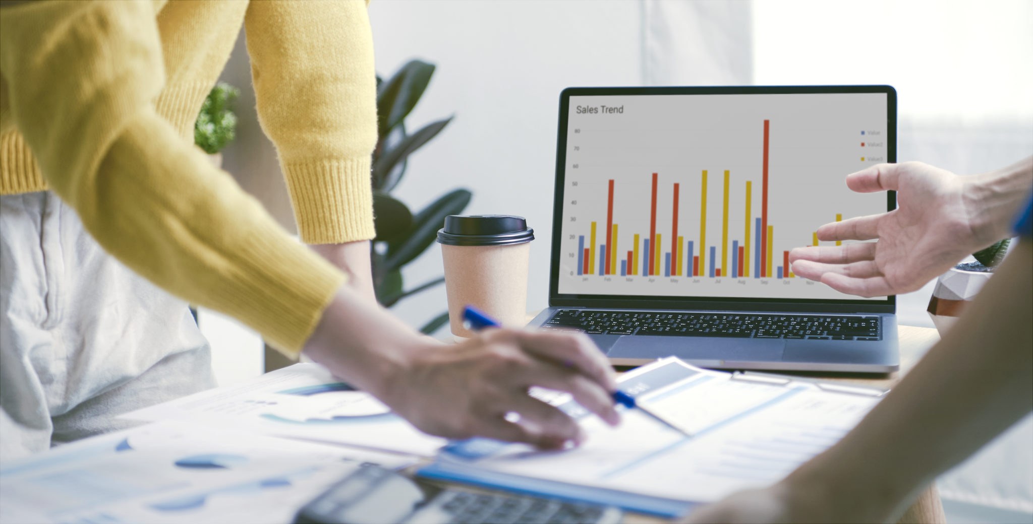 Business owners reviewing financial plans together