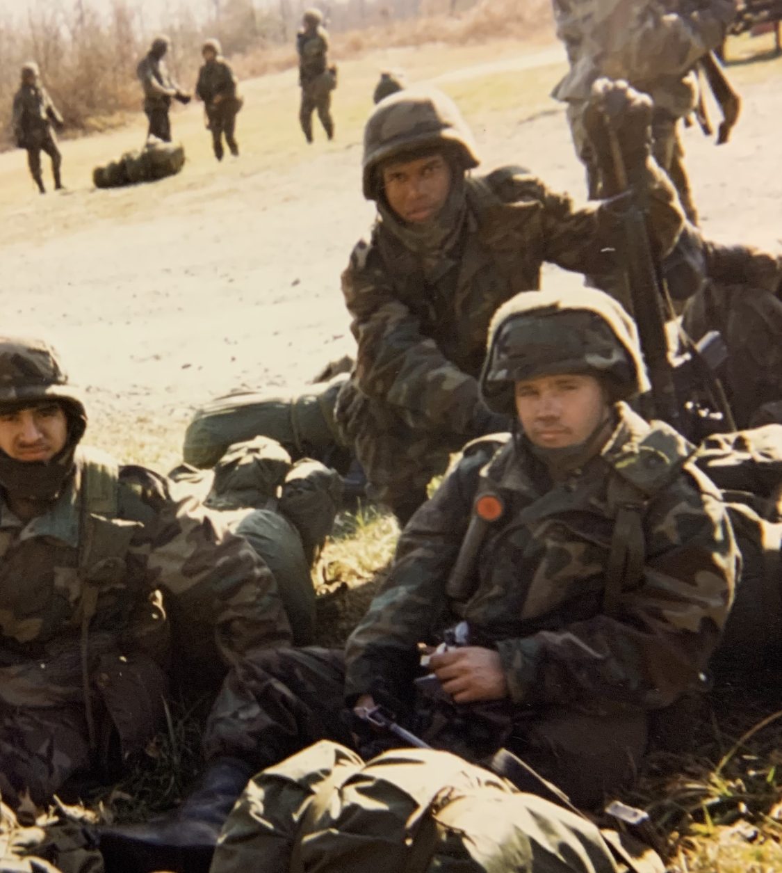 Army field photograph with soldiers and their gear