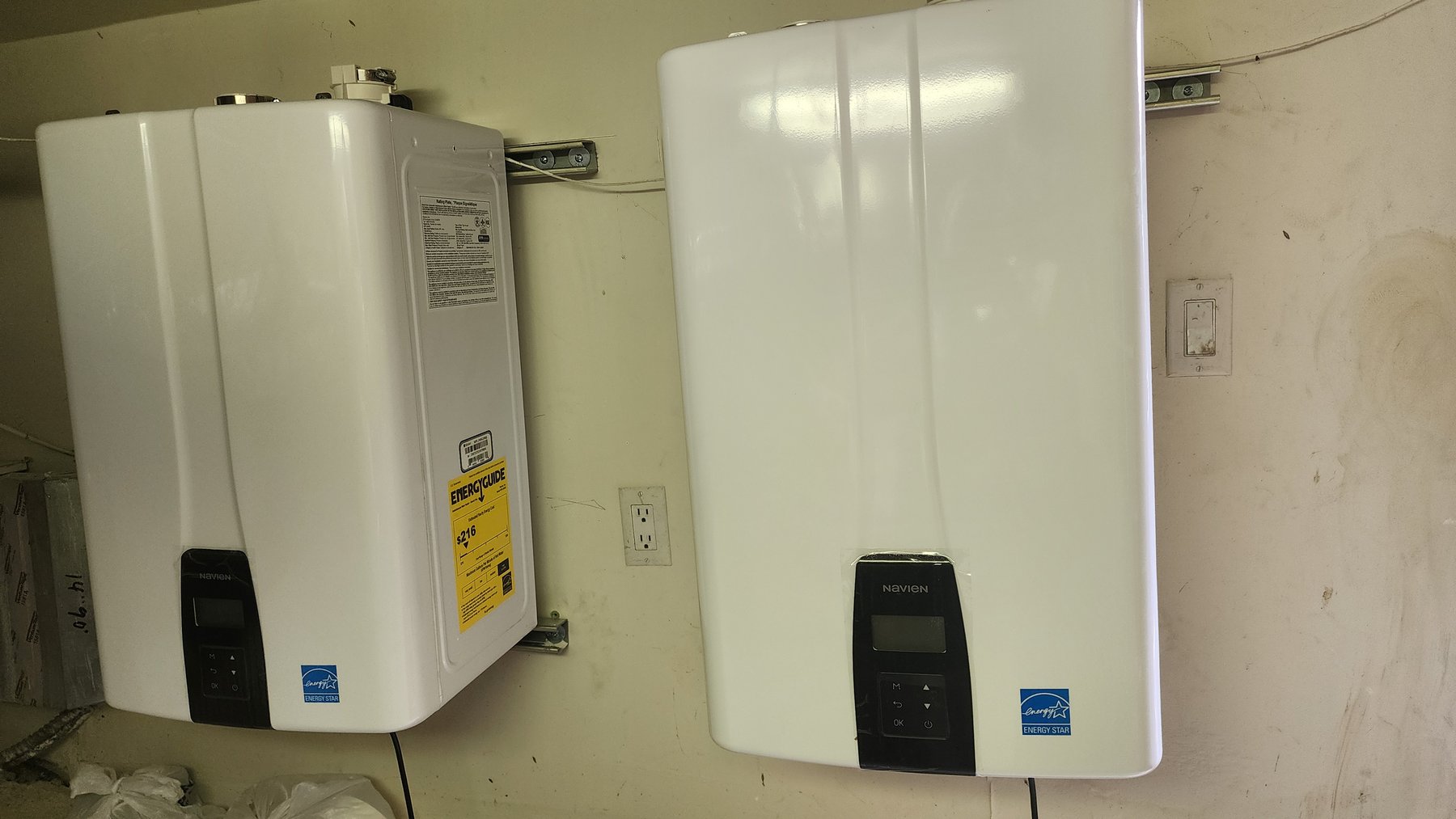 Wall-mounted water heater units at a service location