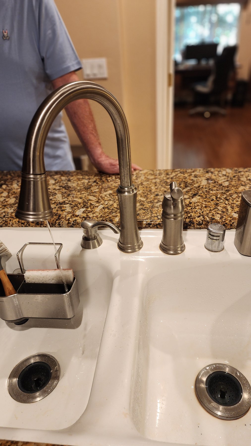 Kitchen faucet and sink fixture at a plumbing service call
