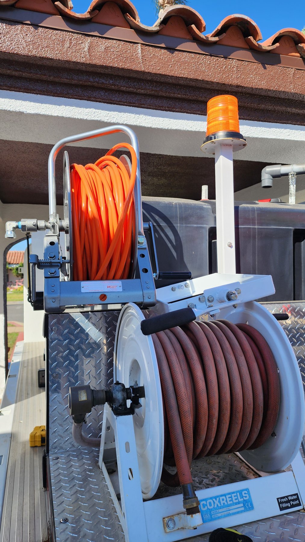 Hydro jetting equipment staged for plumbing service