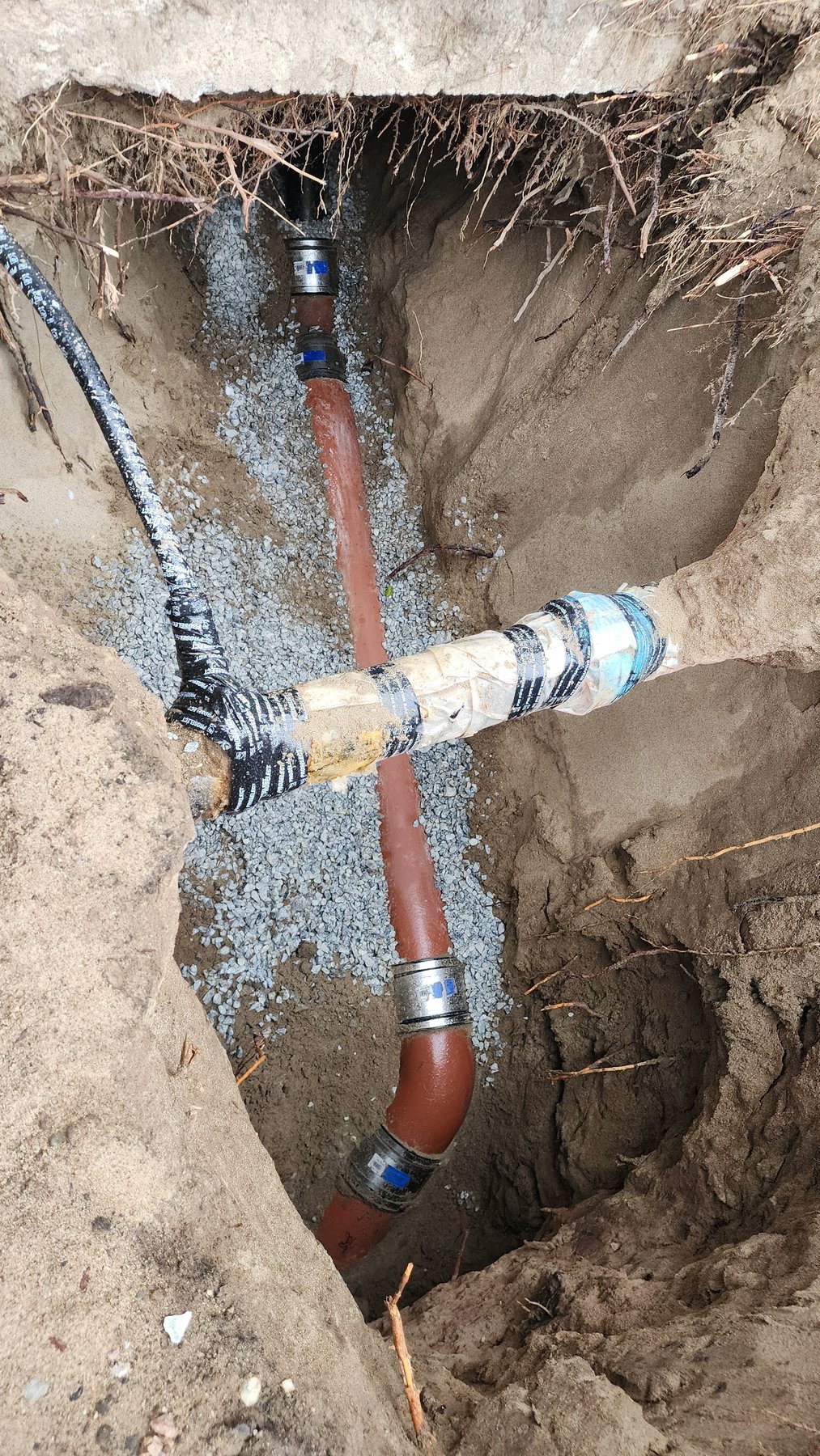 Underground piping exposed during sewer repair work