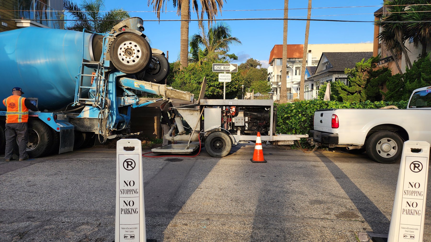 Commercial jobsite with Anytime Rooter equipment and service truck