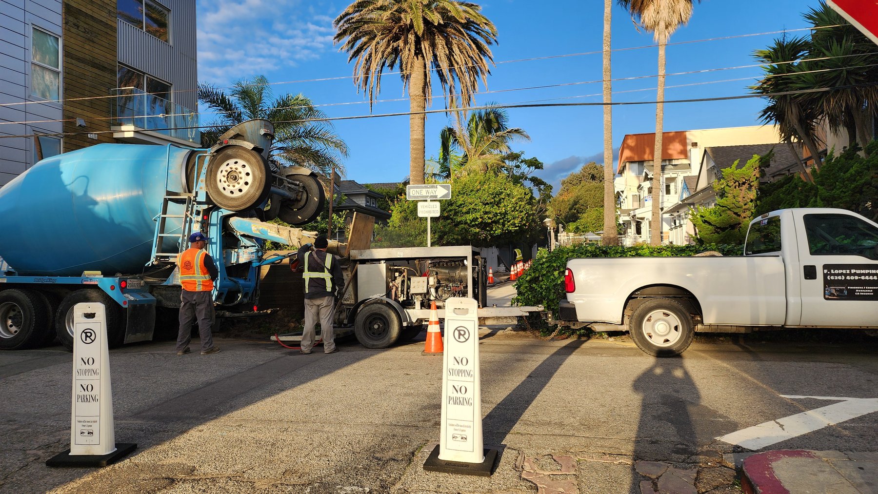 Commercial jobsite with Anytime Rooter equipment and service truck