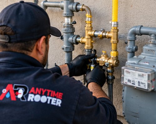 Gas meter with metal piping, brass valves and yellow gas tubing