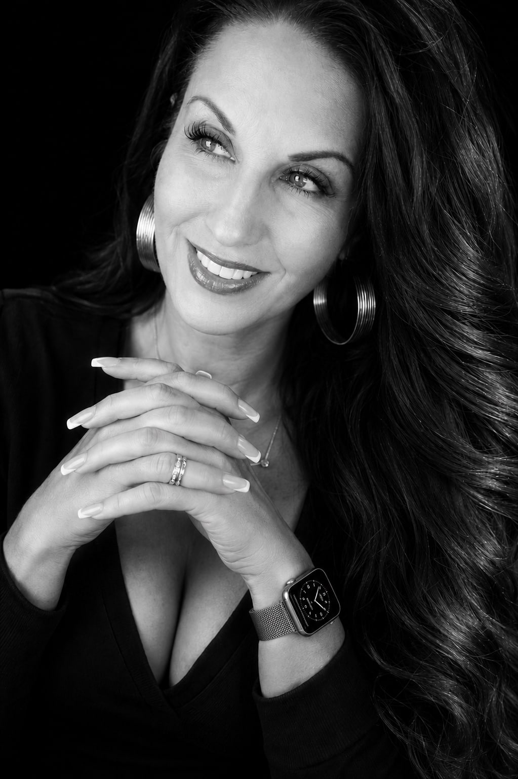 Black-and-white portrait of Stacey Creely.