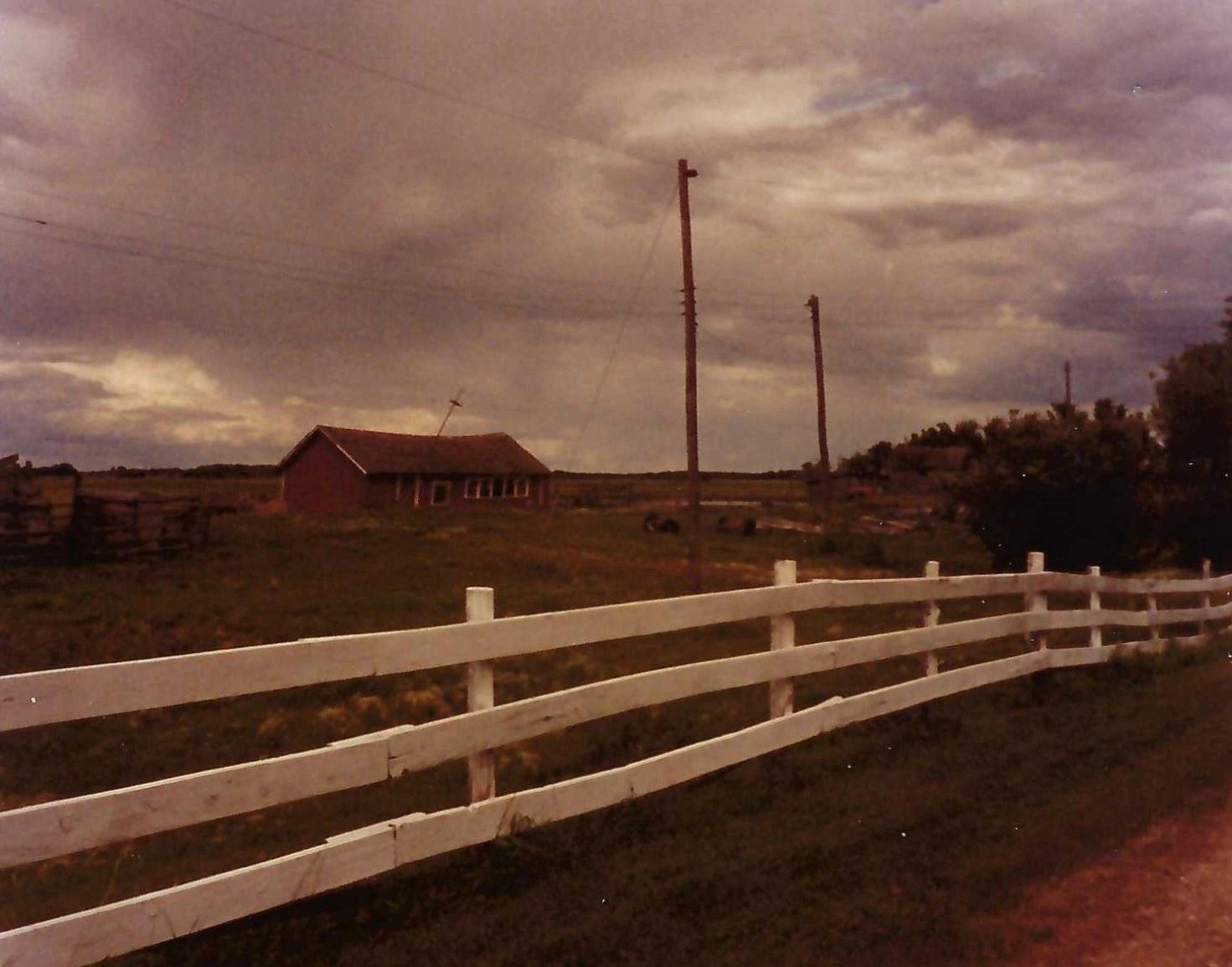 The country road Helen’s mother traveled when she went to school, with the home Helen grew up in.