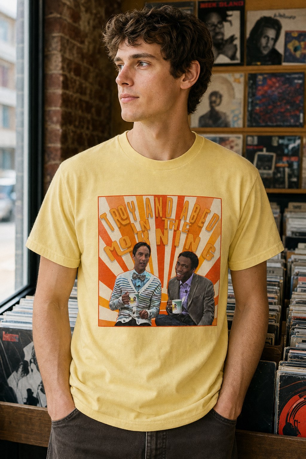 Model wearing the Troy and Abed in the Morning Community TV series graphic tee
