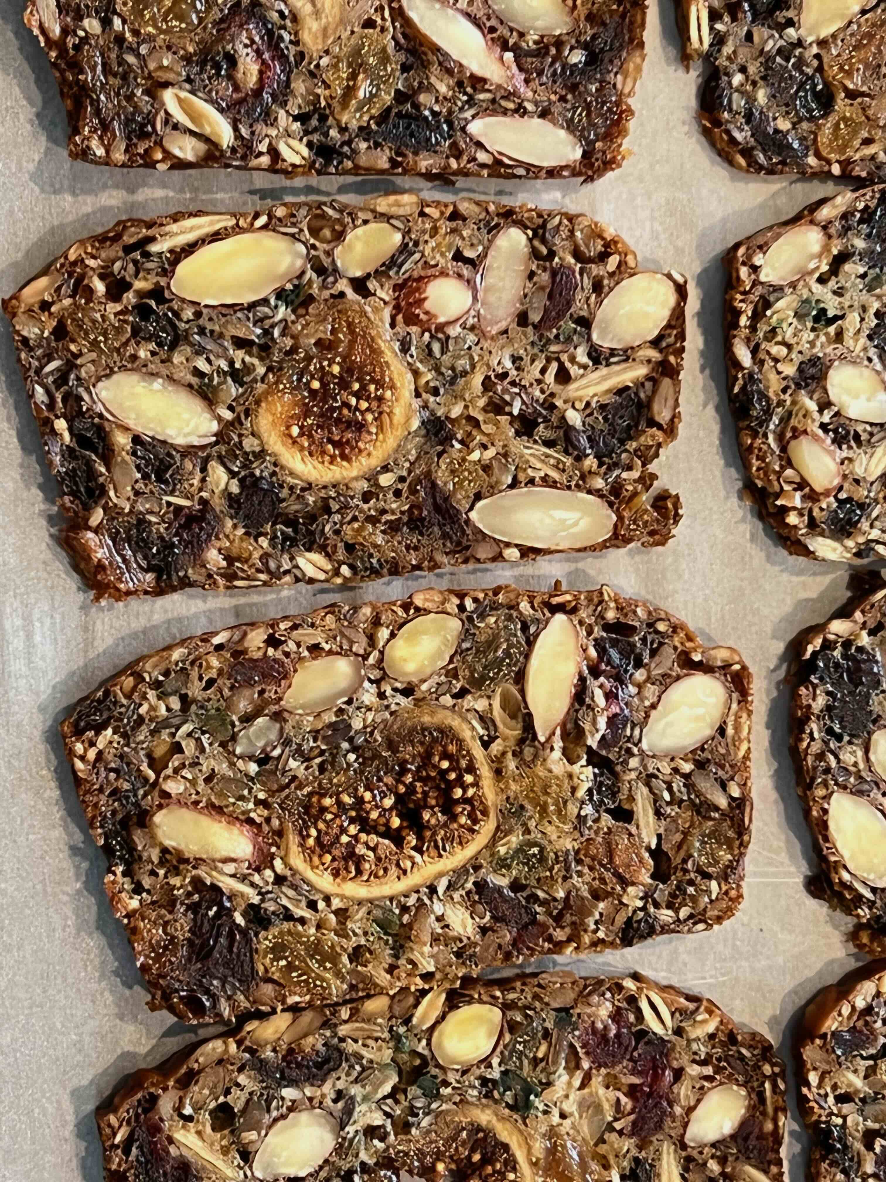 Close-up of sliced Coastal Crisps with almonds and figs
