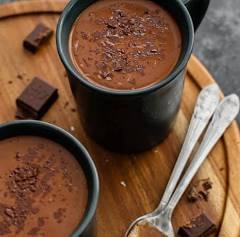 Mugs of hot chocolate with chocolate shavings