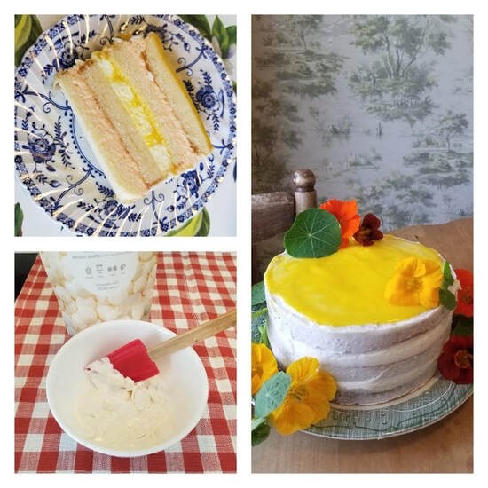 Homemade lemon cake with layers, frosting, and fresh lemon slices.