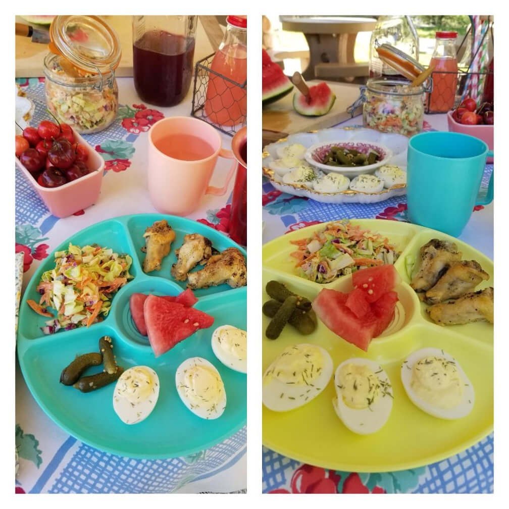 Colorful breakfast plates with eggs, watermelon, and drinks outdoors.