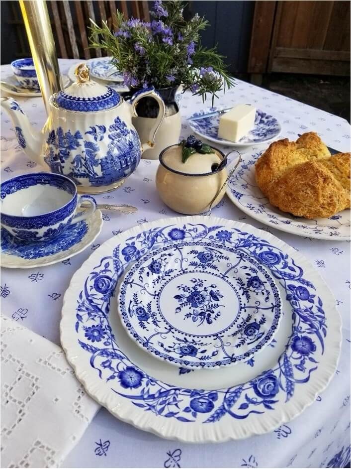 Blue and white tableware with scones.