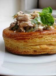 A flaky puff pastry topped with creamy chicken and herbs.