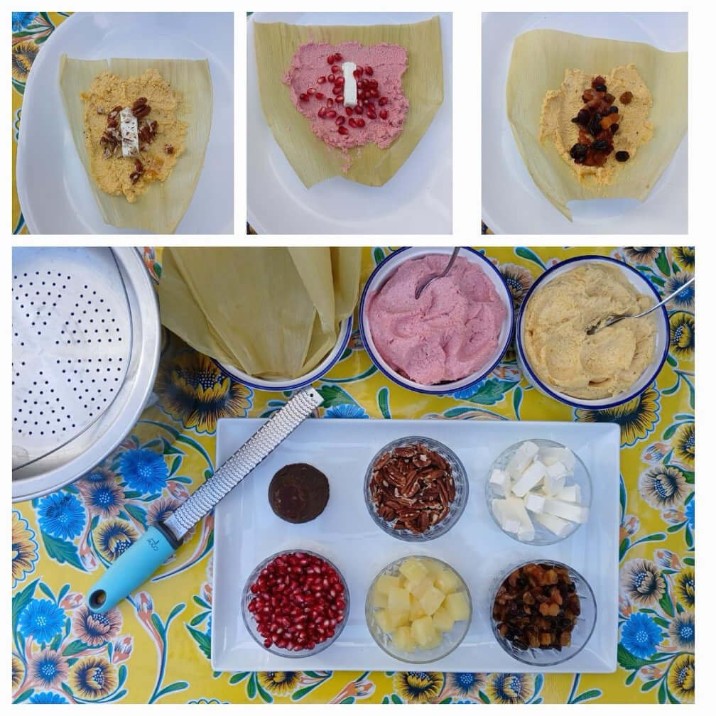 Various ice cream flavors and toppings spread out on a colorful tablecloth.