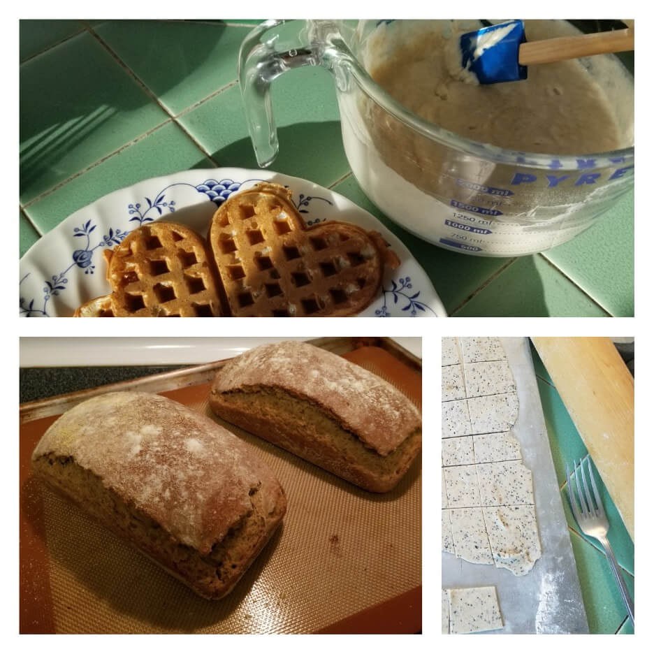 Freshly baked bread and waffles alongside a bowl of batter.