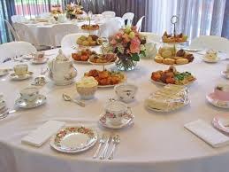 Dining table set with fine china and a floral centerpiece