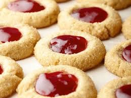Thumbprint cookies filled with red jam.